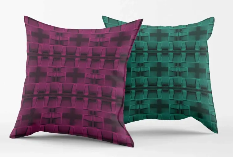 Textile design colorways demonstrated on decorative sofa cushions